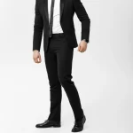 full-length-portrait-businessman-posing-stylishly-white-background